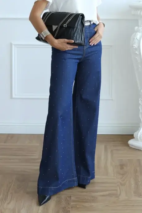 Джинсы со стразами бренда Trash and Luxury
